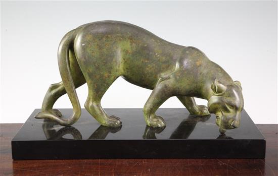 An Art Deco patinated metal model of a panther, 16in.